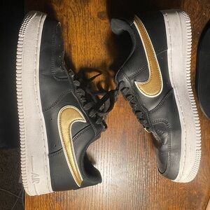 Nike Air Force Ones Black and Gold